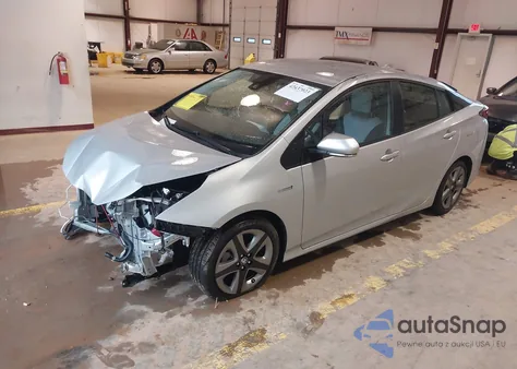 2021 Toyota Prius Xle z USA, uszkodzony, nr VIN JTDKAMFU4M3147210